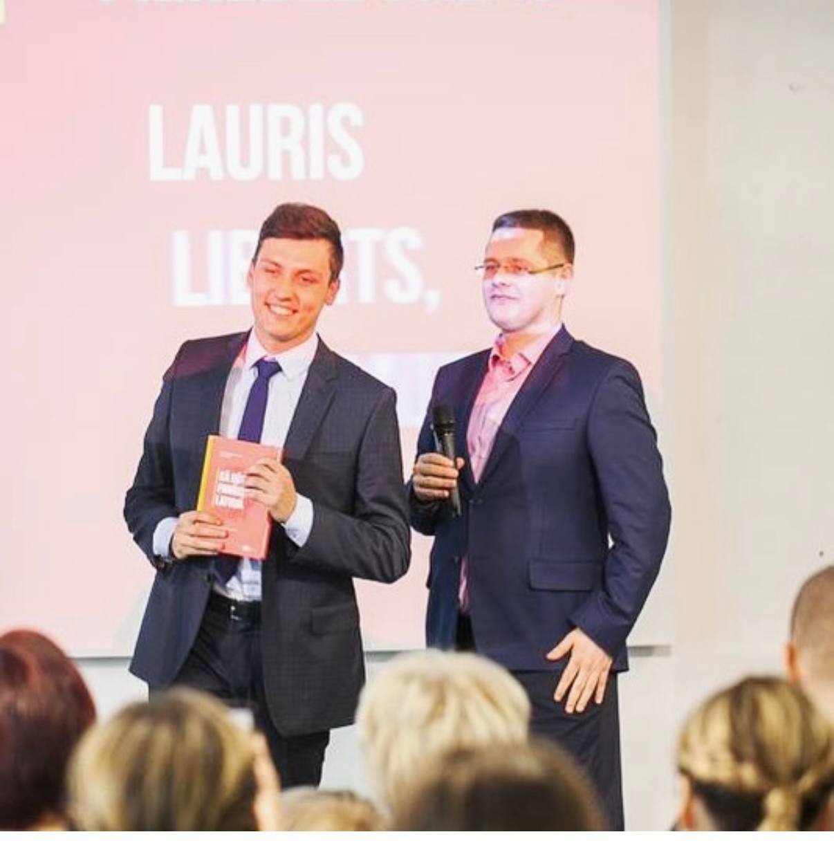 Danila presenting at a business event